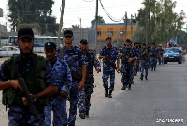 Palestinian Hamas policemen patrol in the central Gaza Strip October 17, 2011, as they patrol during preparations for the release of prisoners in a swap that is expected to take place on Tuesday. Hamas prepared a heroes'...
