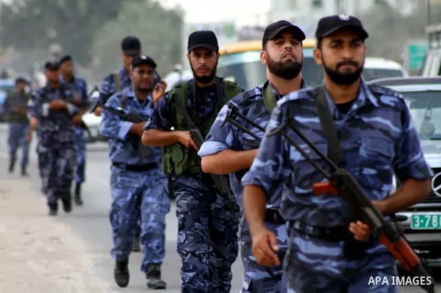 Palestinian Hamas policemen patrol in the central Gaza Strip October 17, 2011, as they patrol during preparations for the release of prisoners in a swap that is expected to take place on Tuesday. Hamas prepared a heroes'...
