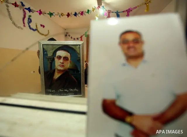 The family of Palestinian prisoner Raafat Aroki gather at a relative's house in the Gaza Strip on 17 October 2011 as they await his release as part of a deal to secure the exchange of Israeli captive soldier Gilad Shalit...
