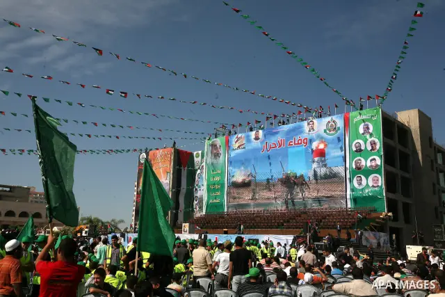 Palestinians participate in the celebrations in Gaza City on October 18, 2011 as an Israeli-Palestinian prisoner swap deal gets under way. Captive Israeli soldier Gilad Shalit was today freed from five years of Hamas cap...