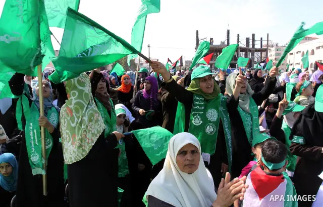 Relatives of Palestinian prisoners about to be freed in a prisoner swap between Hamas and Israel, celebrate as they prepare to receive them in Gaza city October 18, 2011. Gaza's Hamas Islamist rulers released captured Is...