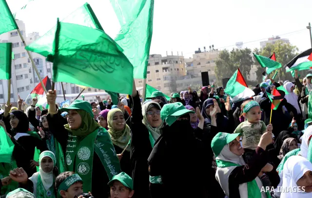 Relatives of Palestinian prisoners about to be freed in a prisoner swap between Hamas and Israel, celebrate as they prepare to receive them in Gaza city October 18, 2011. Gaza's Hamas Islamist rulers released captured Is...
