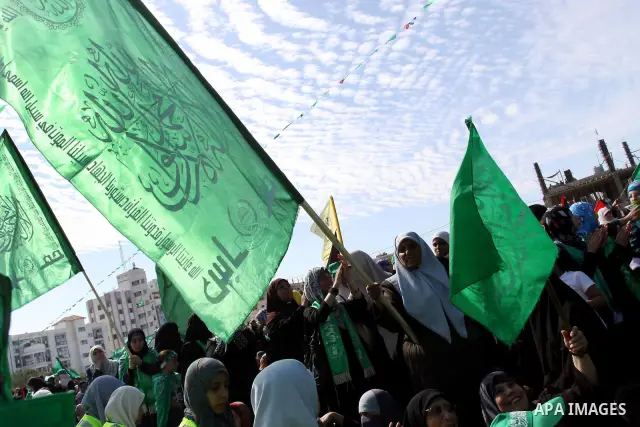 Relatives of Palestinian prisoners about to be freed in a prisoner swap between Hamas and Israel, celebrate as they prepare to receive them in Gaza city October 18, 2011. Gaza's Hamas Islamist rulers released captured Is...