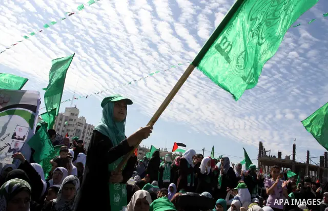 Relatives of Palestinian prisoners about to be freed in a prisoner swap between Hamas and Israel, celebrate as they prepare to receive them in Gaza city October 18, 2011. Gaza's Hamas Islamist rulers released captured Is...