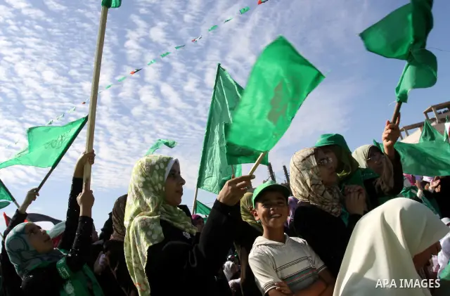 Relatives of Palestinian prisoners about to be freed in a prisoner swap between Hamas and Israel, celebrate as they prepare to receive them in Gaza city October 18, 2011. Gaza's Hamas Islamist rulers released captured Is...