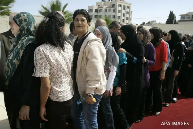 Palestinian president Mahmud Abbas welcomes hundreds of prisoners released from Israeli jails on Oct. 18, 2011 at the Palestinian Authority headquarters in the West Bank city of Ramallah. Hundreds of people gathered in R...