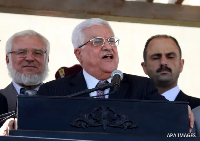 Palestinian president Mahmud Abbas welcomes hundreds of prisoners released from Israeli jails on Oct. 18, 2011 at the Palestinian Authority headquarters in the West Bank city of Ramallah. Hundreds of people gathered in R...