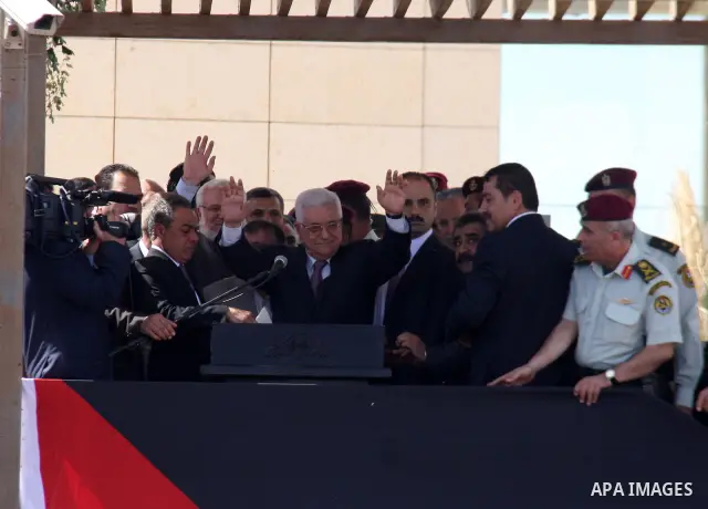 Palestinian president Mahmud Abbas welcomes hundreds of prisoners released from Israeli jails on Oct. 18, 2011 at the Palestinian Authority headquarters in the West Bank city of Ramallah. Hundreds of people gathered in R...