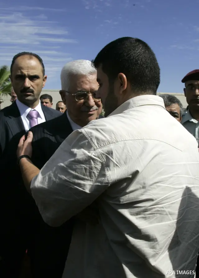Palestinian president Mahmud Abbas welcomes hundreds of prisoners released from Israeli jails on Oct. 18, 2011 at the Palestinian Authority headquarters in the West Bank city of Ramallah. Hundreds of people gathered in R...