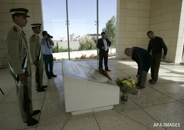 Released Palestinian prisoners read Holy Koran at the tomb of the late Palestinian President Yasser Arafat in the West Bank city of Ramallah, Tuesday, Oct. 18, 2011. Hamas agreed to release Israeli soldier Galit Schalit...