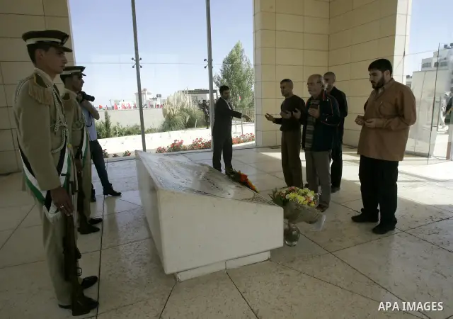 Released Palestinian prisoners read Holy Koran at the tomb of the late Palestinian President Yasser Arafat in the West Bank city of Ramallah, Tuesday, Oct. 18, 2011. Hamas agreed to release Israeli soldier Galit Schalit...