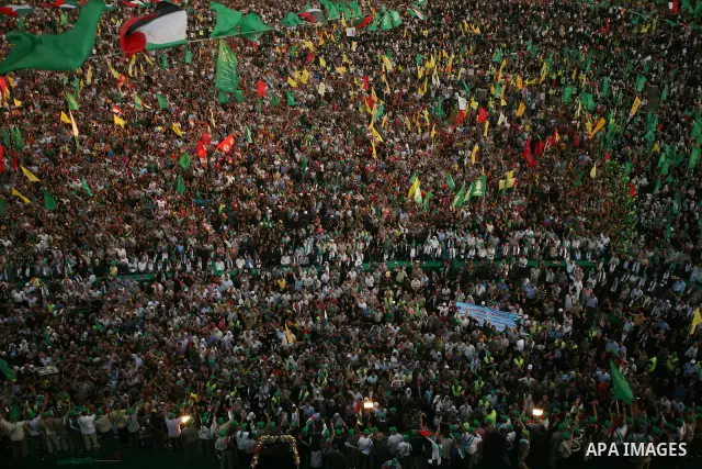 Thousands of Palestinians attend the welcome ceremony held for the Palestinian prisoners released from Israel in al-Katiba Yard in Gaza City, Oct. 18, 2011. Israel and the Palestinians finished on Tuesday the first phase...