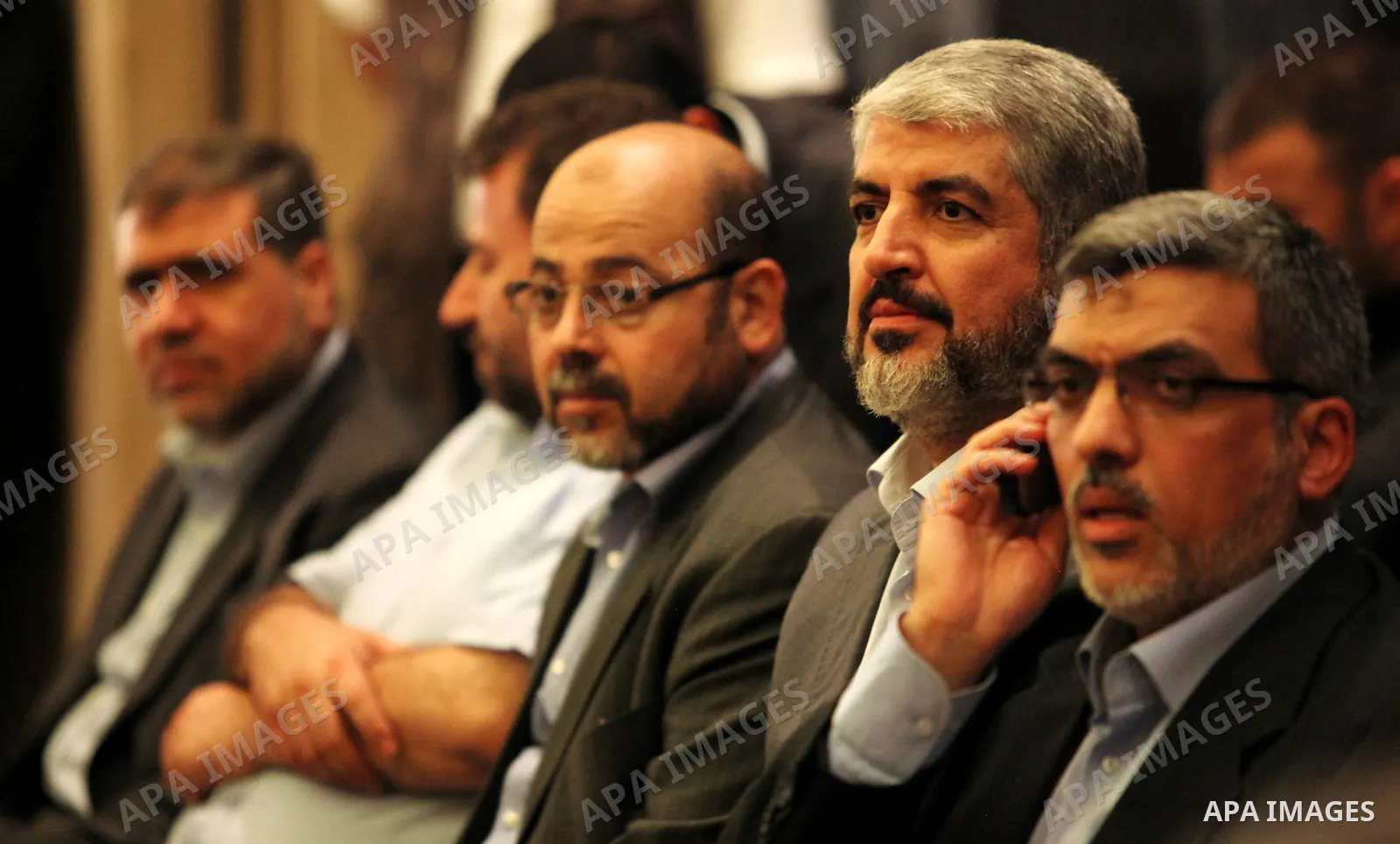 Exiled Palestinian Hamas leader Khaled Meshaal meets with some 40 Palestinian prisoners who were freed by Israel but are to be deported overseas, in Cairo on October 18, 2011. Israeli soldier Gilad Shalit was released in...