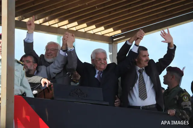 Palestinian president Mahmud Abbas welcomes hundreds of prisoners released from Israeli jails on Oct. 18, 2011 at the Palestinian Authority headquarters in the West Bank city of Ramallah. Hundreds of people gathered in R...