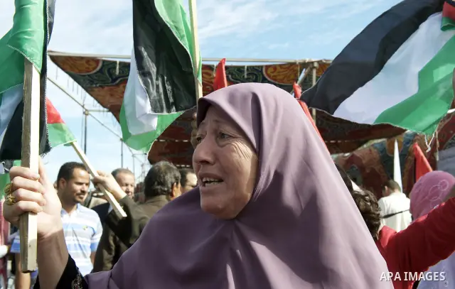 Palestinians celebrate the release of prisoners in Gaza Strip, Tuesday, Oct. 18, 2011. Hamas agreed to release Israeli soldier Galit Schalit in exchange for 1,027 Palestinian prisoners, many of them serving life sentence...