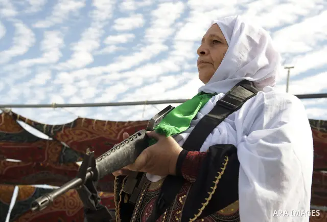 Palestinians celebrate the release of prisoners in Gaza Strip, Tuesday, Oct. 18, 2011. Hamas agreed to release Israeli soldier Galit Schalit in exchange for 1,027 Palestinian prisoners, many of them serving life sentence...
