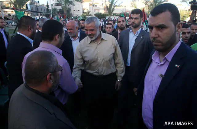 Palestinian prime minister in Gaza Strip, Ismail Haniya visits the tent erected to welcome Palestinian prisoners released in exchange for the captured Israeli soldier Gilad Schalit in Gaza City, Wednesday, Oct. 19, 2011....