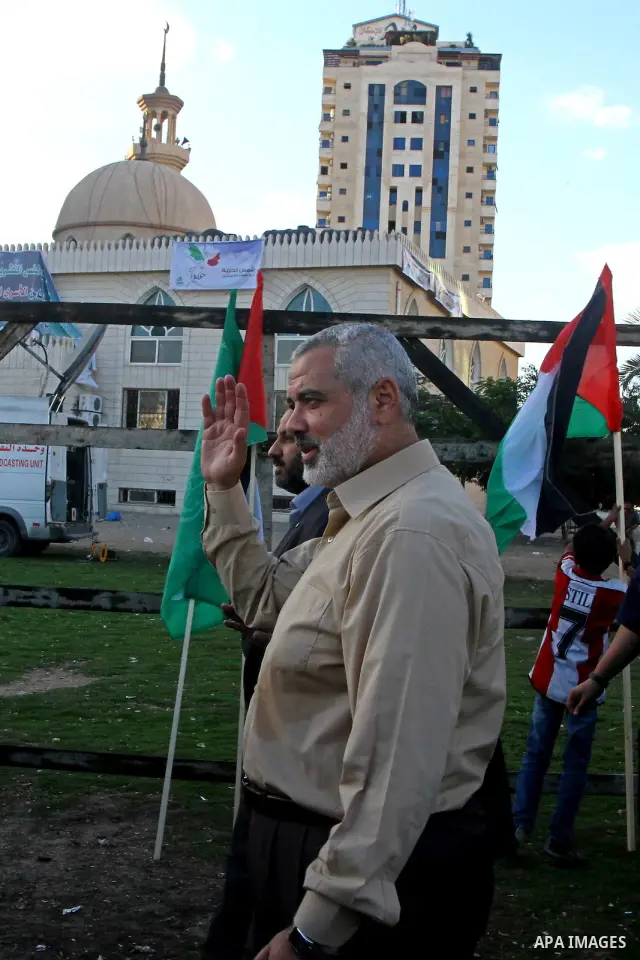 Palestinian prime minister in Gaza Strip, Ismail Haniya visits the tent erected to welcome Palestinian prisoners released in exchange for the captured Israeli soldier Gilad Schalit in Gaza City, Wednesday, Oct. 19, 2011....