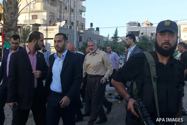 Palestinian prime minister in Gaza Strip, Ismail Haniya visits the tent erected to welcome Palestinian prisoners released in exchange for the captured Israeli soldier Gilad Schalit in Gaza City, Wednesday, Oct. 19, 2011....