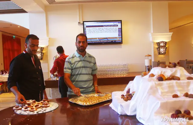 Freed Palestinian prisoners sit in the cafe of Al-Mashtal hotel, where they staying, in the Gaza Strip October 20, 2011. Israeli soldier Gilad Shalit and hundreds of Palestinians crossed Israel's borders in opposite dire...