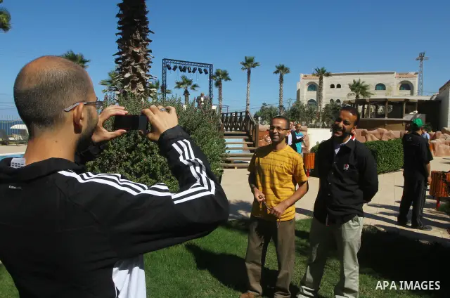 A freed Palestinian prisoner uses his mobile phonel at Al-Mashtal hotel, where he and other former prisoners are currently staying, in the Gaza Strip Oct. 20, 2011. Israeli soldier Gilad Shalit and hundreds of Palestinia...