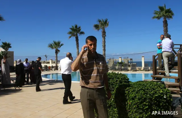 A freed Palestinian prisoner uses his mobile phonel at Al-Mashtal hotel, where he and other former prisoners are currently staying, in the Gaza Strip Oct. 20, 2011. Israeli soldier Gilad Shalit and hundreds of Palestinia...