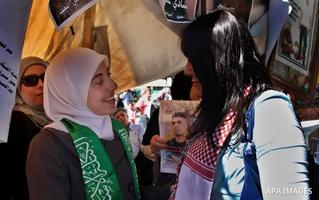 Palestinian Linan Abu Glma , prisoner who was released by the Israeli authorities on Tuesday receives well wishers in the West Bank city of Nablus Thursday , Oct. 20, 2011. Hundreds of Palestinian prisoners were released...