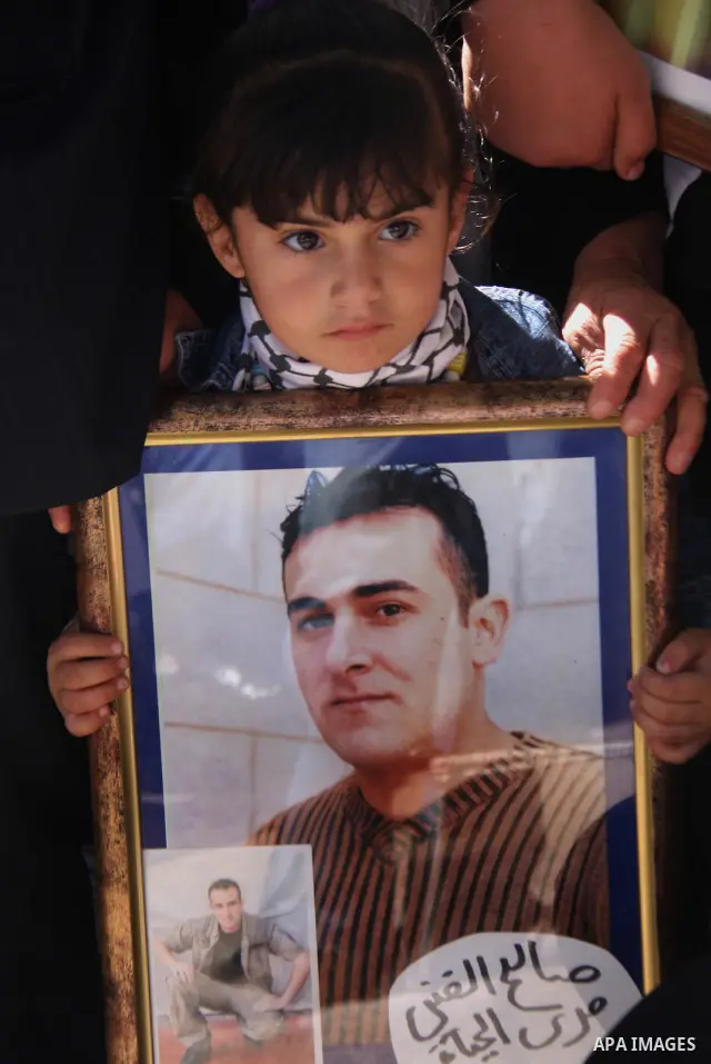 Palestinian Linan Abu Glma , prisoner who was released by the Israeli authorities on Tuesday receives well wishers in the West Bank city of Nablus Thursday , Oct. 20, 2011. Hundreds of Palestinian prisoners were released...