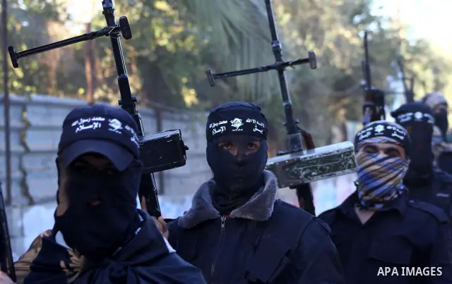 Army of Islam militants patrol during their visit to the freed Palestinian prisoners in Nusairat in central Gaza Strip October 20, 2011.The time is not right for meaningful Israeli-Palestinian peace talks, Palestinian Pr...