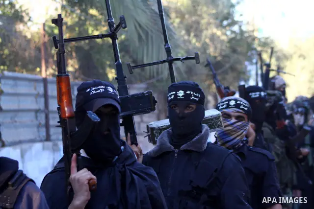 Army of Islam militants patrol during their visit to the freed Palestinian prisoners in Nusairat in central Gaza Strip October 20, 2011.The time is not right for meaningful Israeli-Palestinian peace talks, Palestinian Pr...