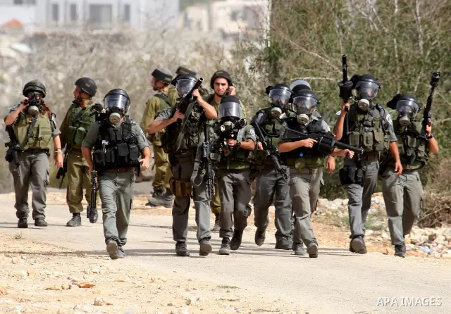 Israeli border police officers clash with Palestinian demonstrators as they demand access to their land near Kufr Qaddum, close to the northern West Bank Jewish settlement of Kdumim, Friday, Oct. 21, 2011. Photo by Wagdi...