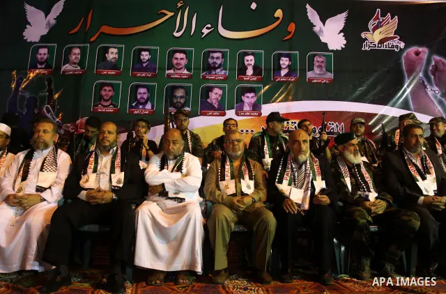 Hamas leaders and freed Palestinian prisoners attend a celebration for the release of hundreds of prisoners following a swap with captured Israeli soldier Gilad Shalit on October 21, 2011 in Khan Yunis, southern Gaza Str...