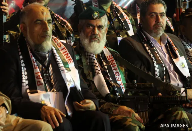 Freed Palestinian prisoners attend a celebration for the release of hundreds of prisoners following a swap with captured Israeli soldier Gilad Shalit on October 21, 2011 in Khan Yunis, southern Gaza Strip. Hamas rulers a...