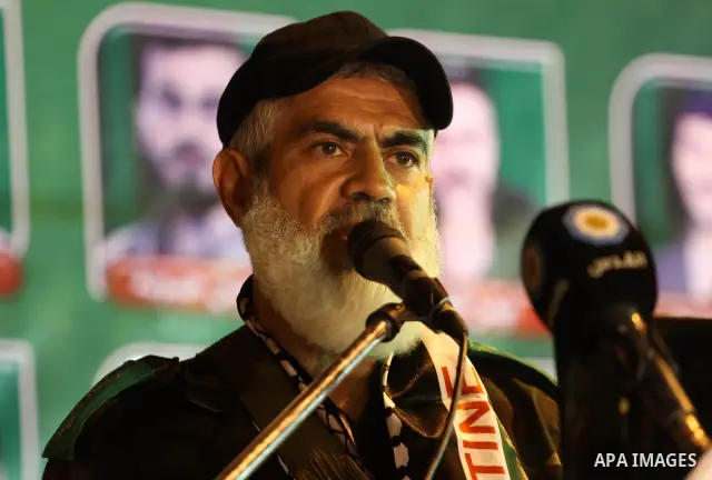 Freed Palestinian prisoner Rawhe Mushtaha speaks during a celebration for the release of hundreds of prisoners following a swap with captured Israeli soldier Gilad Shalit on October 21, 2011 in Khan Yunis, southern Gaza...