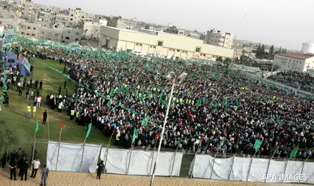Palestinian supporters of the Islamic group Hamas celebrate the release of hundreds of prisoners following a swap with captured Israeli soldier Gilad Shalit on October 21, 2011 in Khan Yunis, southern Gaza Strip. Hamas r...