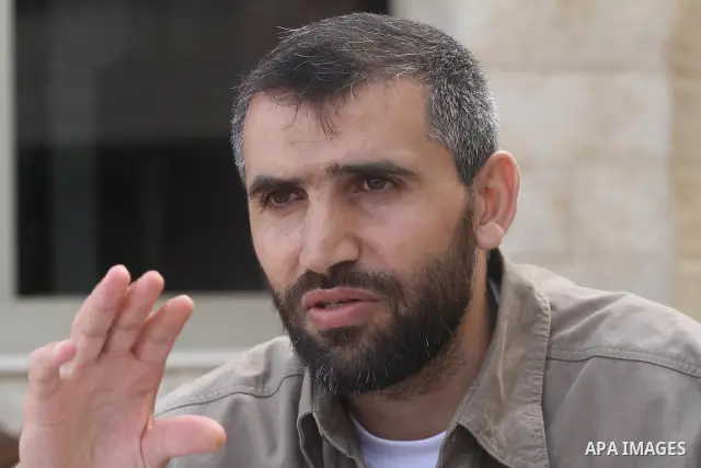 A freed Palestinian prisoner KHowailed Ramadan sits at the Al-Mashtal hotel, where a group of prisoners were exiled upon their release from Israeli jails, in Gaza City October 22, 2011. They come from all over the West B...