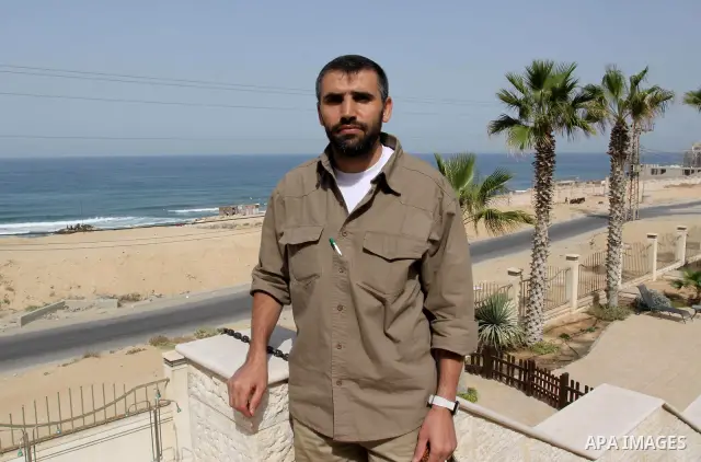 A freed Palestinian prisoner KHowailed Ramadan sits at the Al-Mashtal hotel, where a group of prisoners were exiled upon their release from Israeli jails, in Gaza City October 22, 2011. They come from all over the West B...