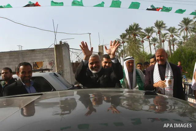 Palestinian prime minister in Gaza Strip, Ismail Haniya, visits a freedom prisoner Ahmad El-Faleet released in exchange for the captured Israeli soldier Gilad Schalit in Gaza City, Wednesday, Oct. 22, 2011.. Photo by Ash...