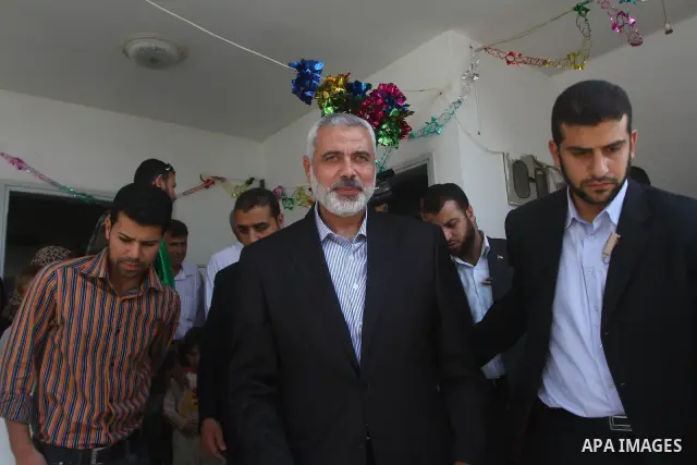 Palestinian prime minister in Gaza Strip, Ismail Haniya, visits a freedom prisoner Ahmad El-Faleet released in exchange for the captured Israeli soldier Gilad Schalit in Gaza City, Wednesday, Oct. 22, 2011.. Photo by Ash...