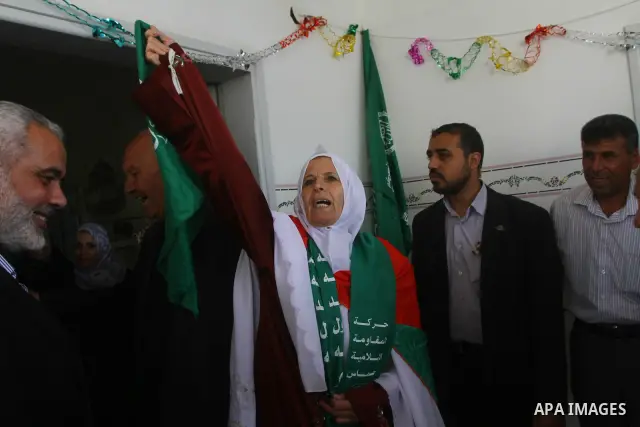 Palestinian prime minister in Gaza Strip, Ismail Haniya, visits a freedom prisoner Ahmad El-Faleet released in exchange for the captured Israeli soldier Gilad Schalit in Gaza City, Wednesday, Oct. 22, 2011.. Photo by Ash...