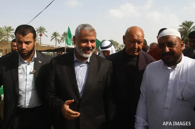 Palestinian prime minister in Gaza Strip, Ismail Haniya, visits a freedom prisoner Ahmad El-Faleet released in exchange for the captured Israeli soldier Gilad Schalit in Gaza City, Wednesday, Oct. 22, 2011.. Photo by Ash...