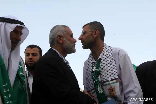 Palestinian prime minister in Gaza Strip, Ismail Haniya, visits a freedom prisoner Ahmad El-Faleet released in exchange for the captured Israeli soldier Gilad Schalit in Gaza City, Wednesday, Oct. 22, 2011.. Photo by Ash...