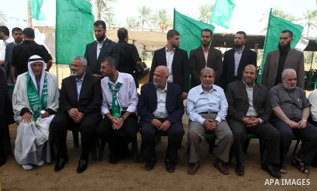 Palestinian prime minister in Gaza Strip, Ismail Haniya, visits a freedom prisoner Ahmad El-Faleet released in exchange for the captured Israeli soldier Gilad Schalit in Gaza City, Wednesday, Oct. 22, 2011.. Photo by Ash...