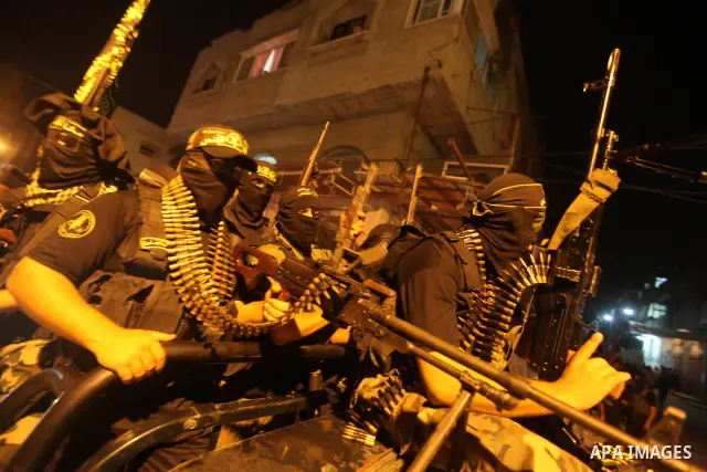 Islamic Jehad militants patrol during their visit to the freed Palestinian prisoners in Gaza City October 20, 2011.. Photo by Majdi Fathi