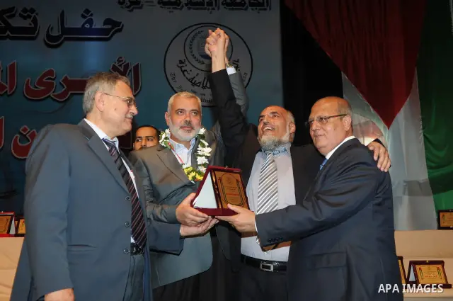 Palestinian Prime Minister in Gaza Strip, Ismail Haniyeh honors freedom prisoners at the Islamic University in Gaza City on Oct. 23, 2011. Photo by Ahmed Shaat