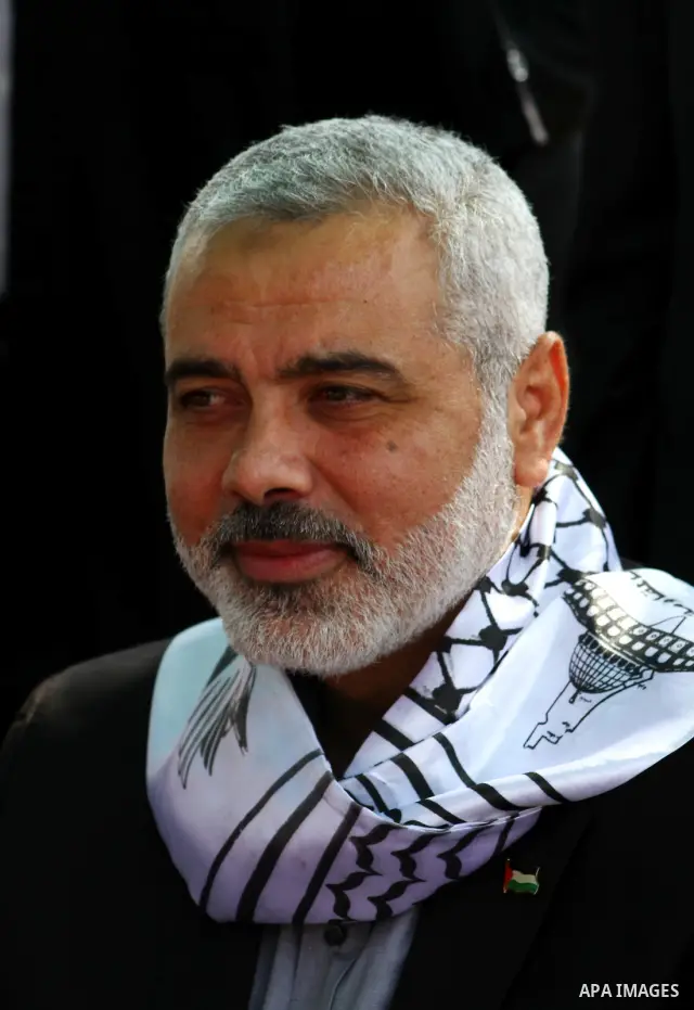Palestinian prime minister in Gaza Strip, Ismail Haniya attends a celebration in Gaza city on Oct. 24,2011 with freed Palestinian prisoners who released to the Gaza Strip in a dramatic swap for a captive Israeli soldier...