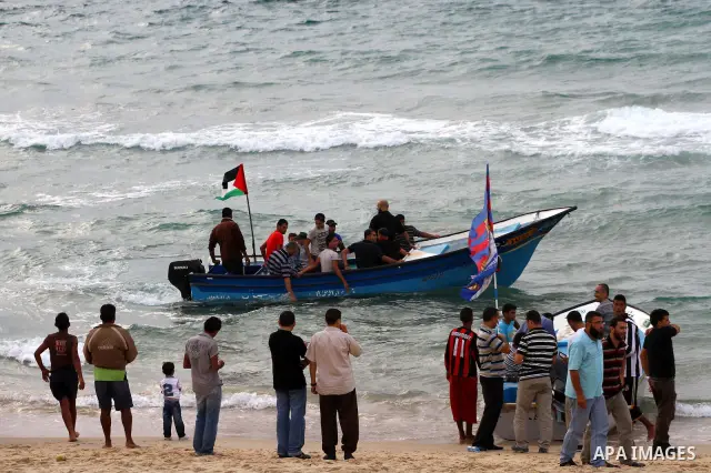 Freed Palestinian prisoners and their relatives attend a celebration on Gaza city beach on Oct. 25,2011. Prisoners released to the Gaza Strip in a dramatic swap for a captive Israeli soldier Gilad Shalit last week after...