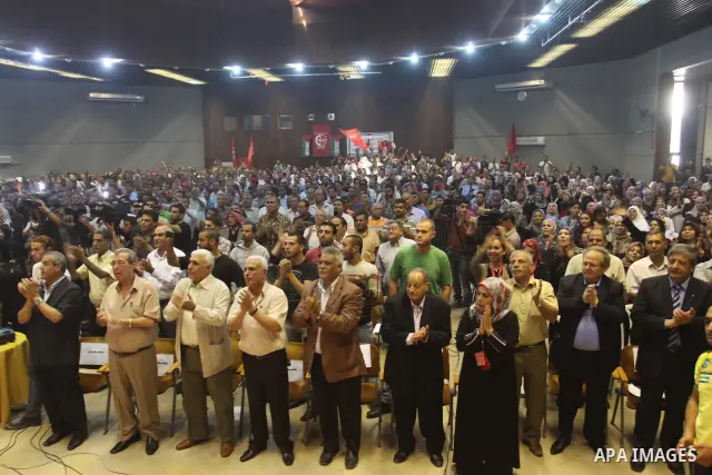 Freed Palestinian prisoners and their relatives attend a celebration organized by the Popular for Liberation Palestine in Gaza city on Oct. 26,2011. Prisoners released to the Gaza Strip in a dramatic swap for a captive I...