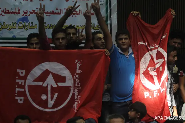 Freed Palestinian prisoners and their relatives attend a celebration organized by the Popular for Liberation Palestine in Gaza city on Oct. 26,2011. Prisoners released to the Gaza Strip in a dramatic swap for a captive I...