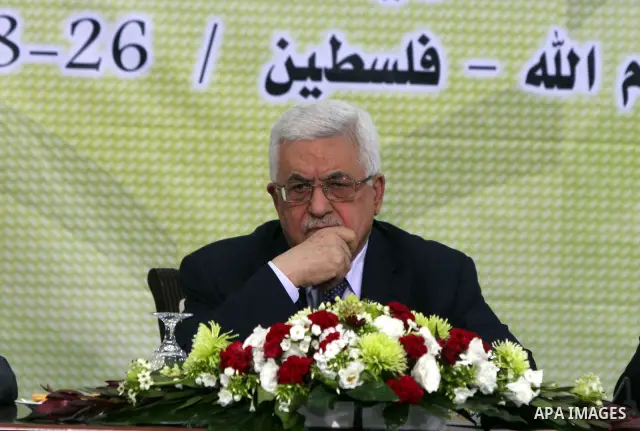 Palestinian Authority president and head of the Fatah movement Mahmud Abbas attends a Fatah "Revolutionary Council" meeting in the Palestinian West Bank city of Ramallah along with top officials on October 26, 2011, as t...